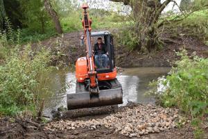 Digger in the brook